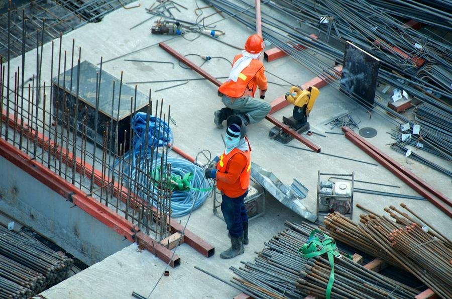 Industrial construction site with workers